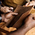 Person holding vegetable-tanned leather